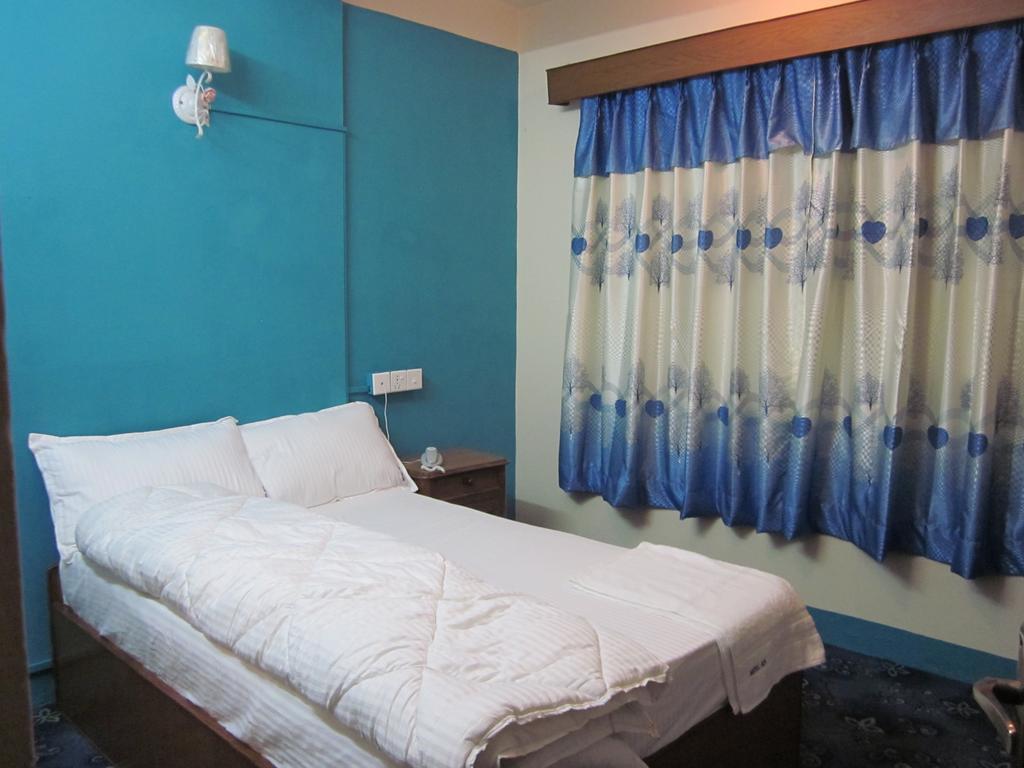 Hotel Api Katmandu Szoba fotó